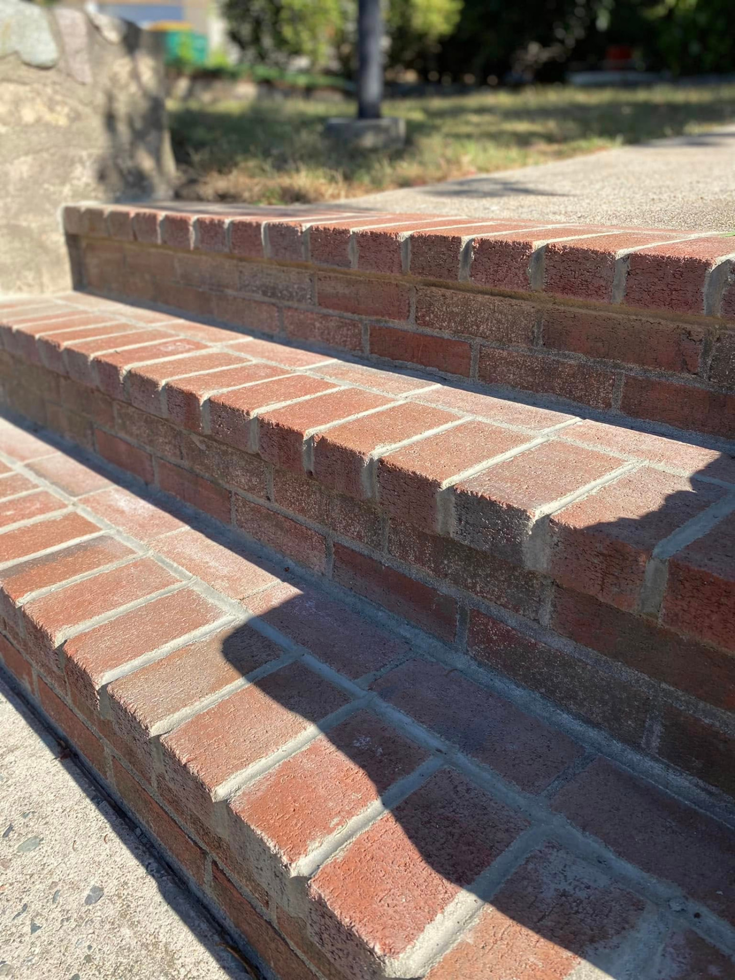 Close detail of clean brick steps and mortar joints